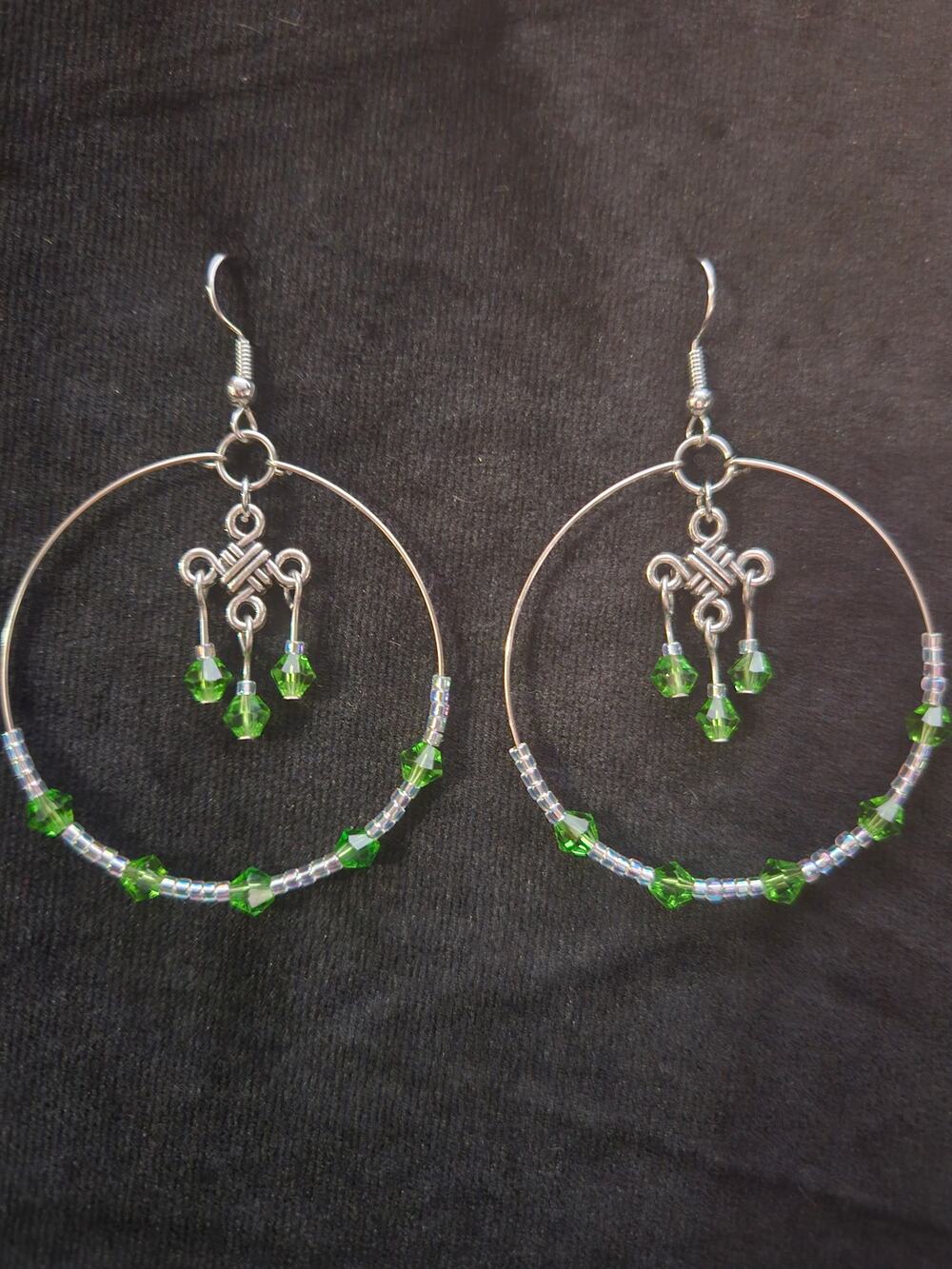 Antique silver Celtic knot and light green beaded hoop earrings